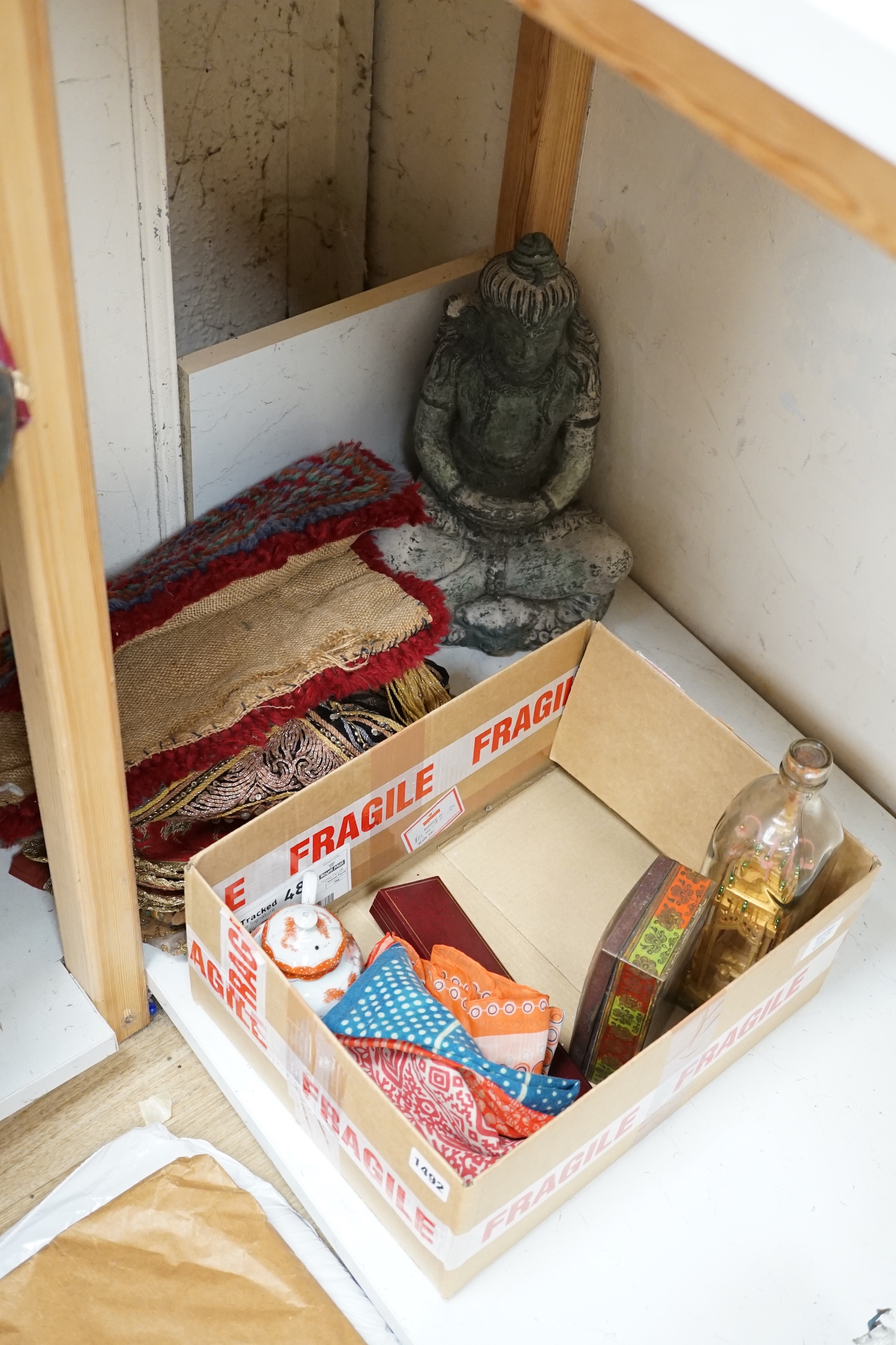 Eastern sundry items including empanelled trinket box, sequinned elephant design bag and composition figure of seated Buddha, together with a Chinese porcelain teapot